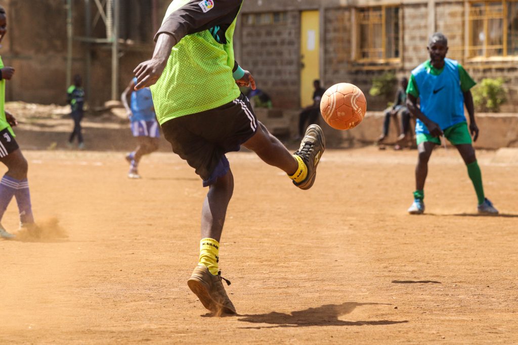 Mathare Youth Sports Association Boys and Girls Playing Soccer